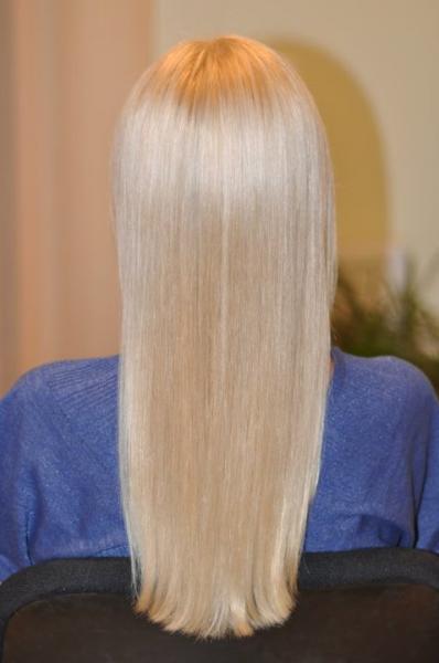 Blonde hair colour with a light grey tint