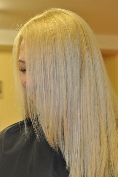 Blonde hair colour with a grey tint