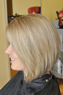 Hair cutting and colouring in highlights